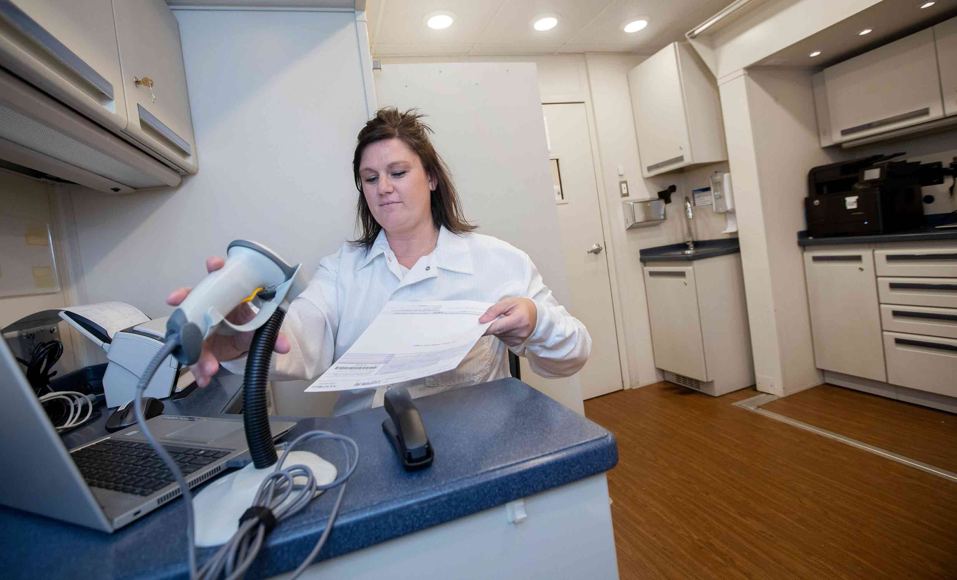 healthcare worker doing paperwork