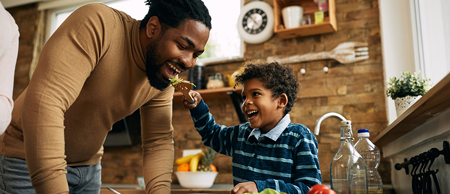 Son feeding father healthy food