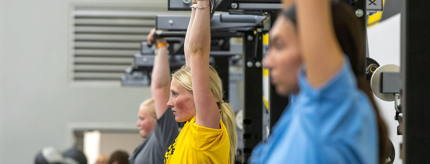 high school athletes training with coach